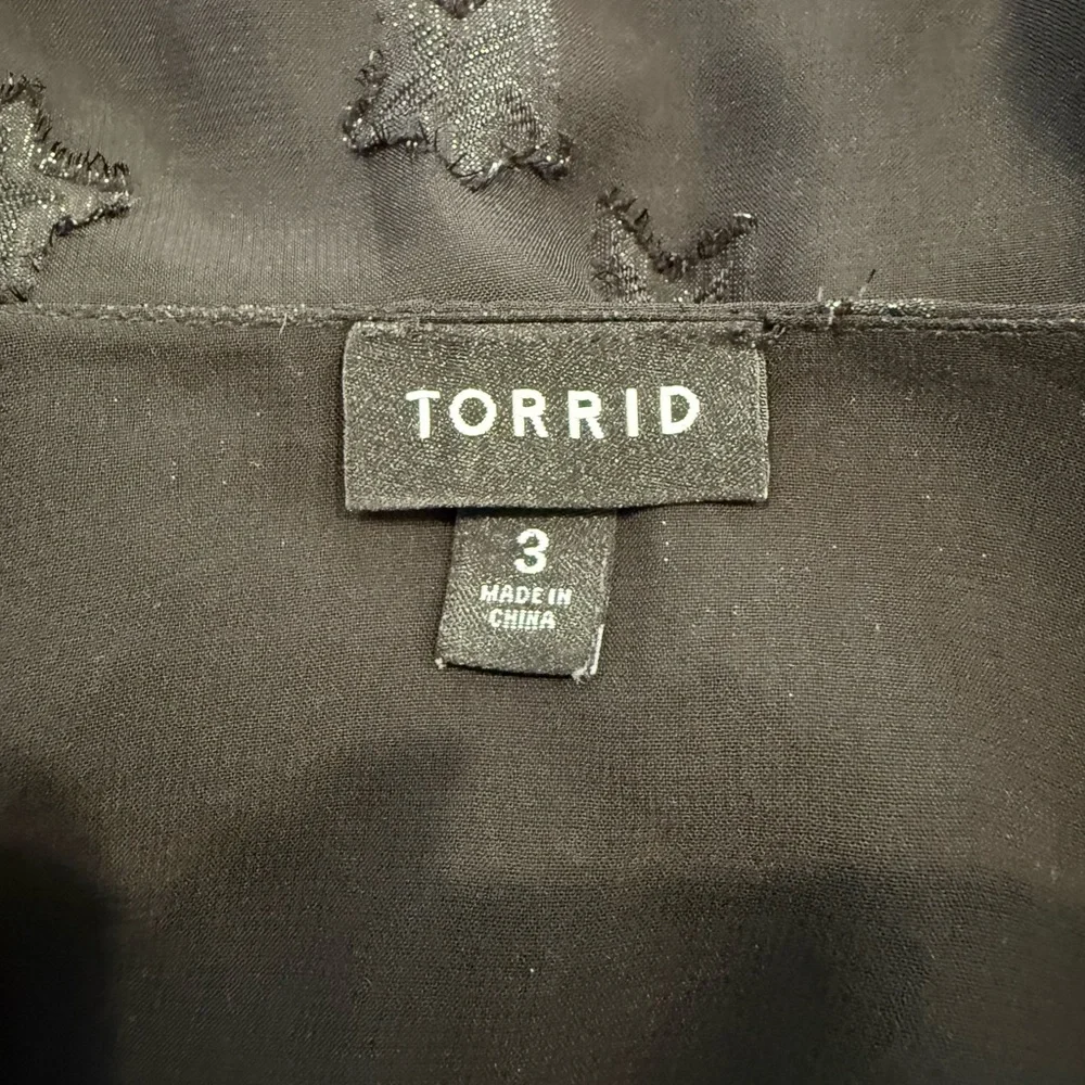 Torrid Lurex Star Surplice Ruffle‎ Hem Top